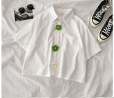 Camisa blusa informal con botones de margaritas